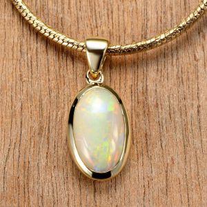 1.69ct Black Opal Pendant 10K Yellow Gold Tiny Galaxies Collection by Anderson-Beattie.com
