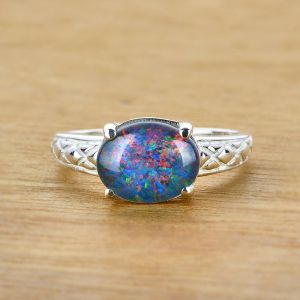 Elegant 10x8mm Oval Opal Claw Inlay Prong Setting Silver Ring by Anderson-Beattie.com