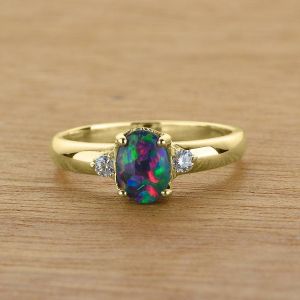 Women's 14K or 18K Gold 7x5mm Opal Ring w/ White Diamond Accents by Anderson-Beattie.com