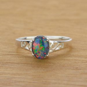 Lovely Claw Inlay 8x6mm Oval Opal Ring in 925 Sterling Silver by Anderson-Beattie.com