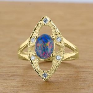 Women's 8x6mm Oval Opal Ring w/ White Diamond Accents in 14K Gold by Anderson-Beattie.com